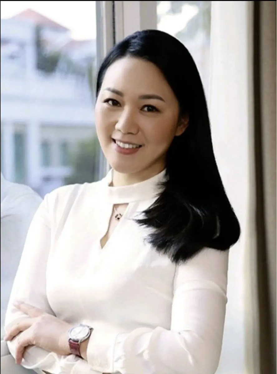 Détails des poursuites contre Binance et Coinbase. Guanying Chen, directeur financier de Binance. Détails des poursuites contre Binance et Coinbase. Guanying Chen, directeur financier de Binance. Photo.
