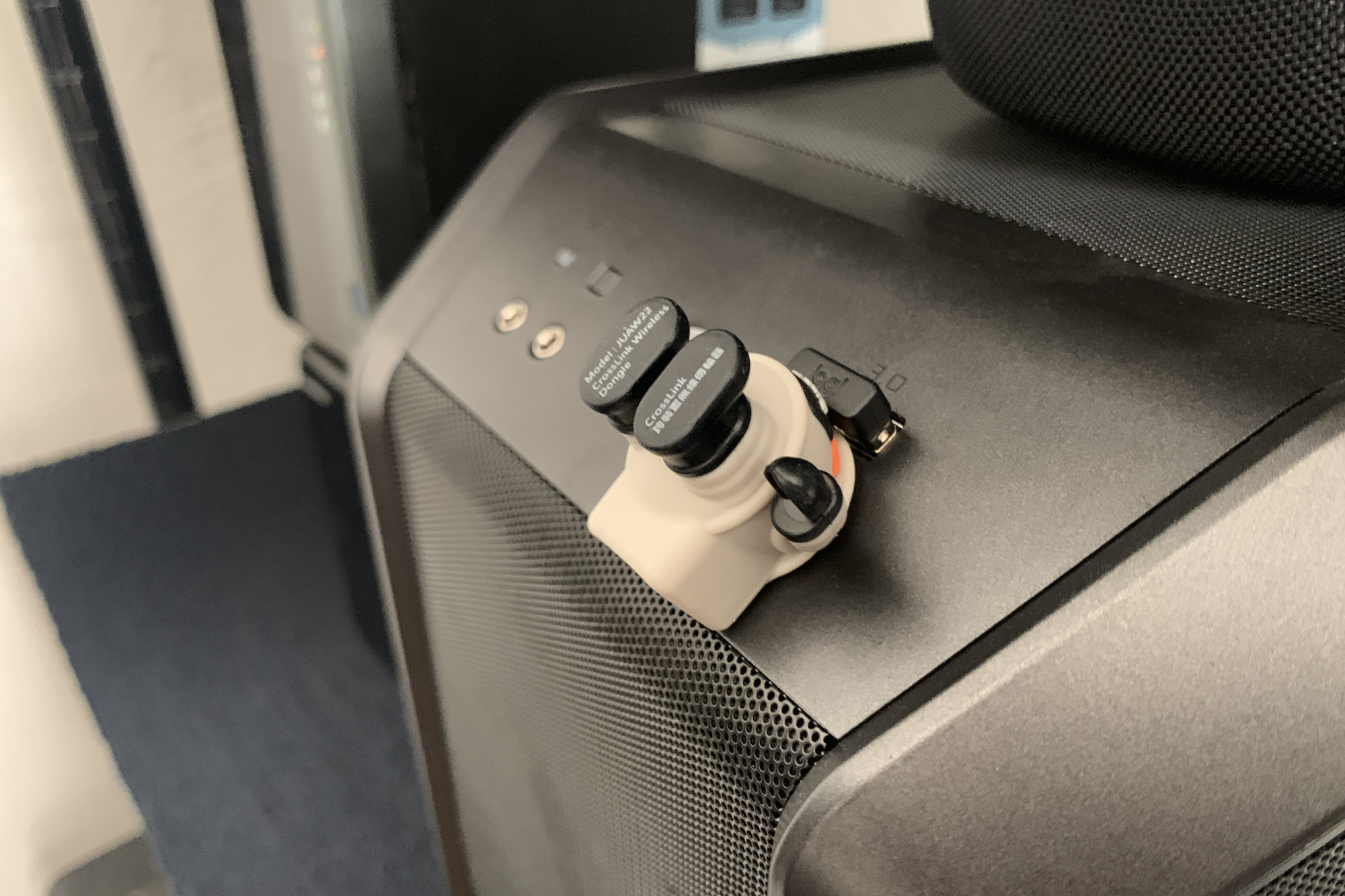 I tried a tiny astronaut dongle that makes Windows and iPhone play nice