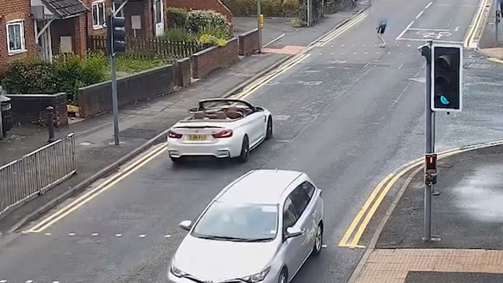 BMW driver smashes into man sending him catapulting into backseat | News