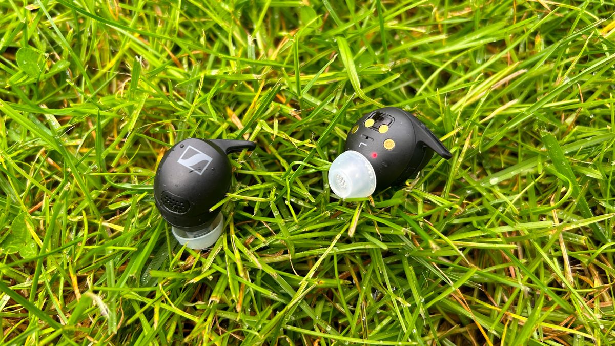 Sennheiser Momentum Sport earbuds on grass