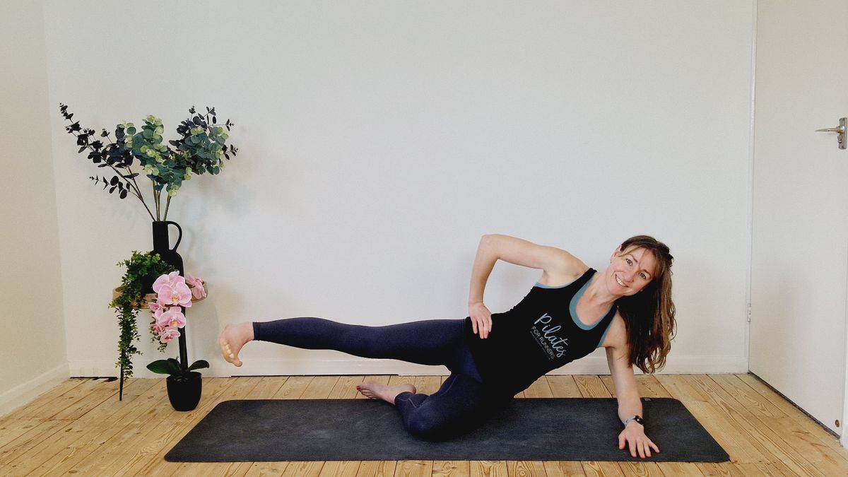 Liz Patient demonstrates the side kick Pilates exercise