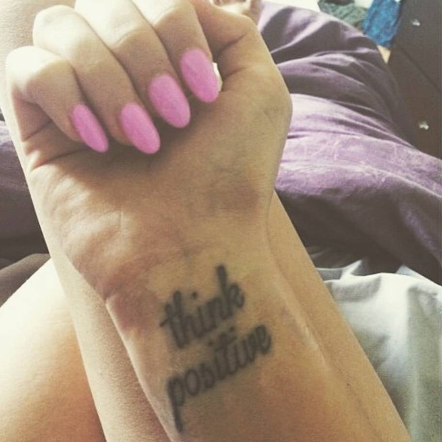 Think Positive" Tattoo On Chels' Wrist.