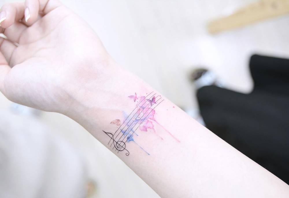 Butterfly Music Staff Tattoo On The Left Inner Wrist. 686_x_1000_jpg
