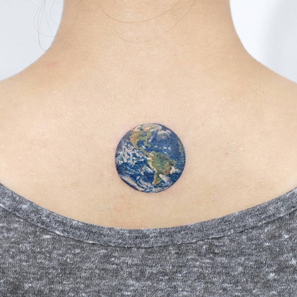 Earth Planet Tattoo On The Upper Back. 1000_x_1000_jpg