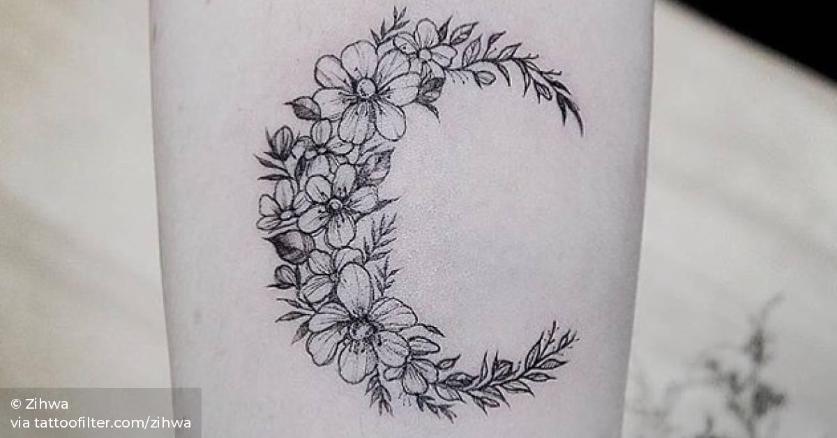 Moon Shaped Flower Wreath Tattoo On The Forearm. 628_x_1200_jpg