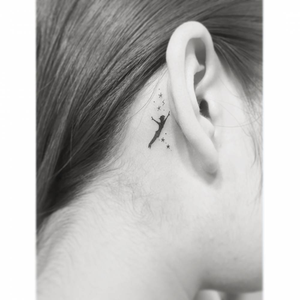 Peter Pan Tattoo Behind The Right Ear. 1000_x_1000_jpg