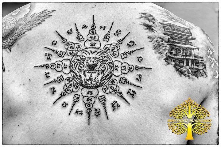 Sak Yant Style Tattoo On The Upper Back. 480_x_720_jpg