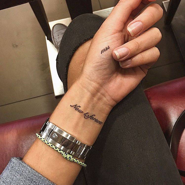 Now And Forever" Tattoo On The Left Inner Wrist, And