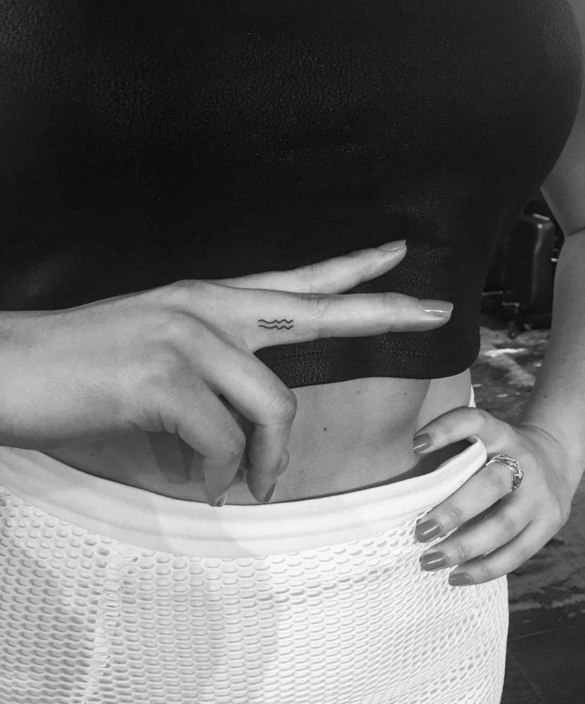 Fine Line Style Tattoo Of The Aquarius Zodiacal Sign. 1000_x_832_jpg