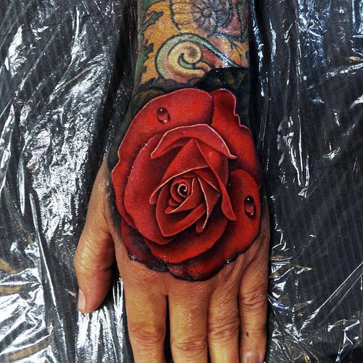Realistic Red Rose Tattoo On The Right Hand. Done At 750_x_750_jpg