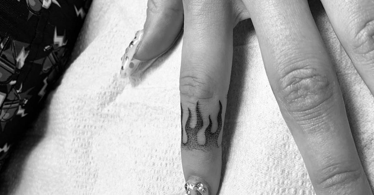 Finger Flame Tattoo On Dua Lipa. 628_x_1200_jpg