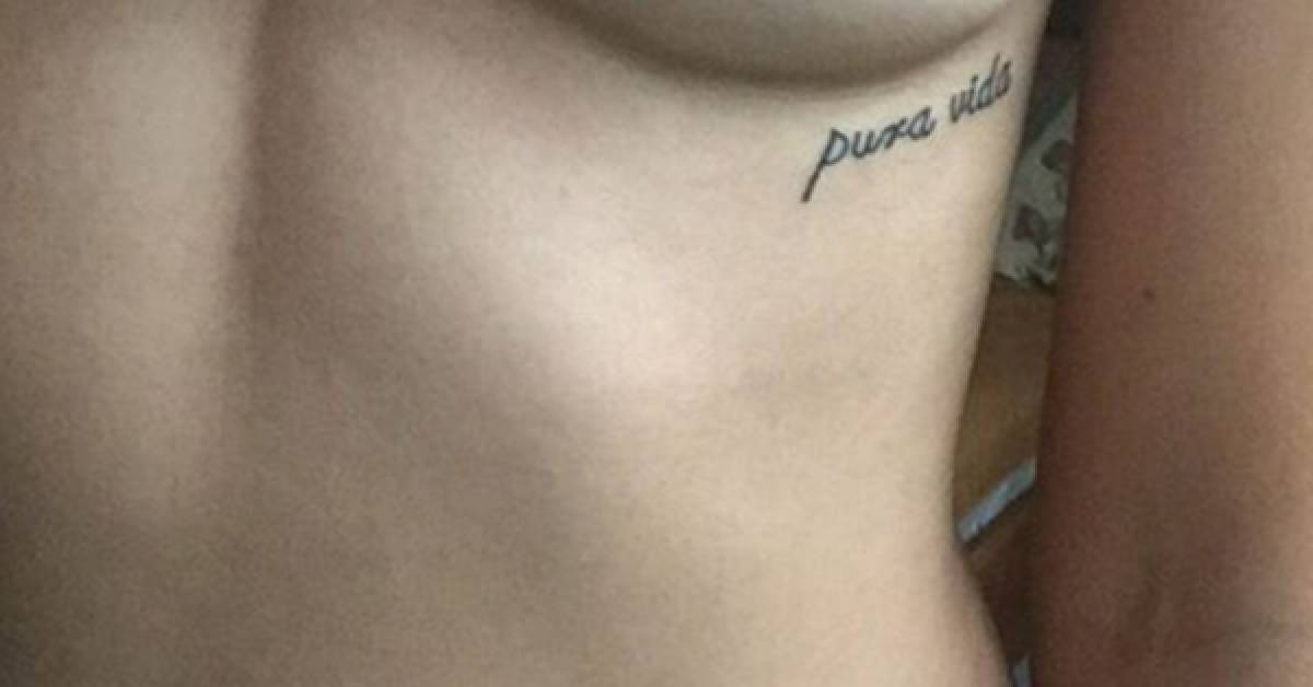 Under Breast Tattoo Saying 'Pura Vida' On Maria. 628_x_1200_jpg