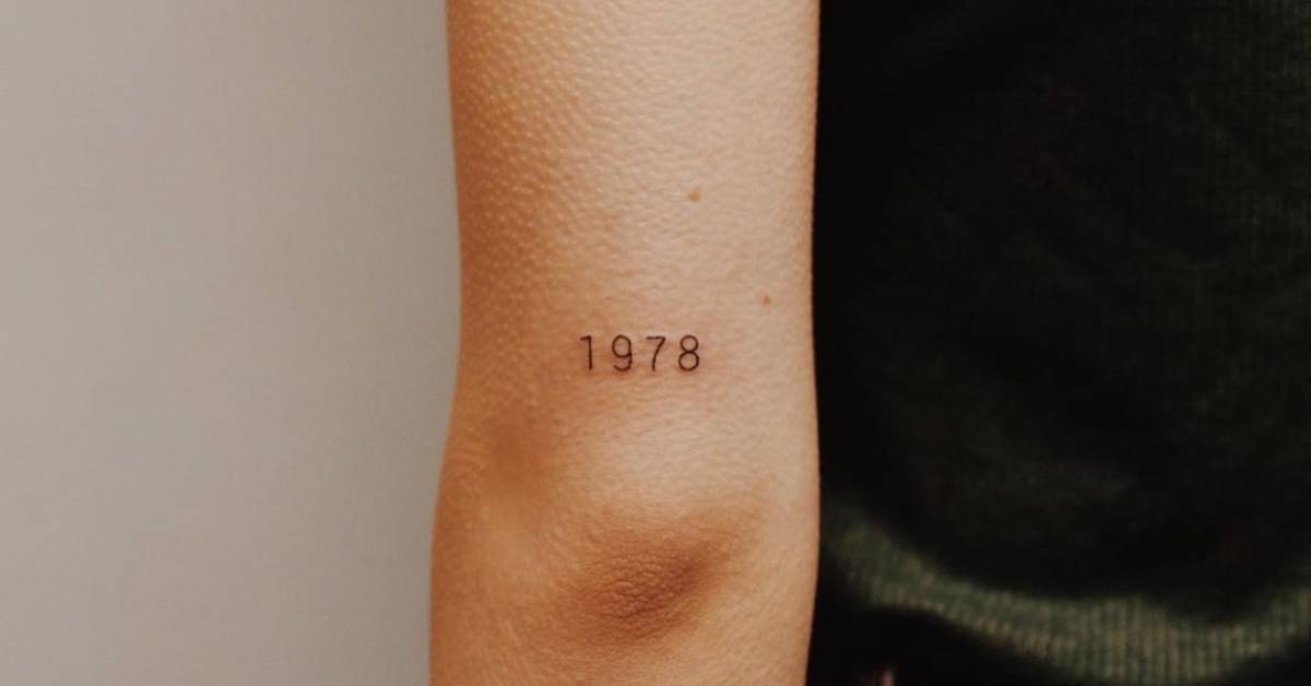 1978" Lettering Tattoo On The Tricep 628_x_1200_jpg