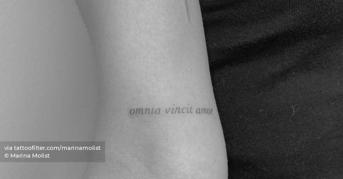 Omnia Vincit Amor" Lettering Tattoo On The Bicep 628_x_1200_jpg