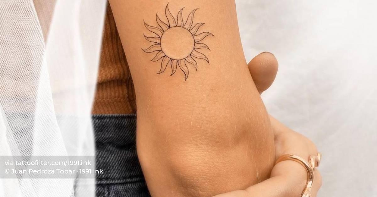 Fine Line Sun Tattoo On The Tricep 628_x_1200_jpg