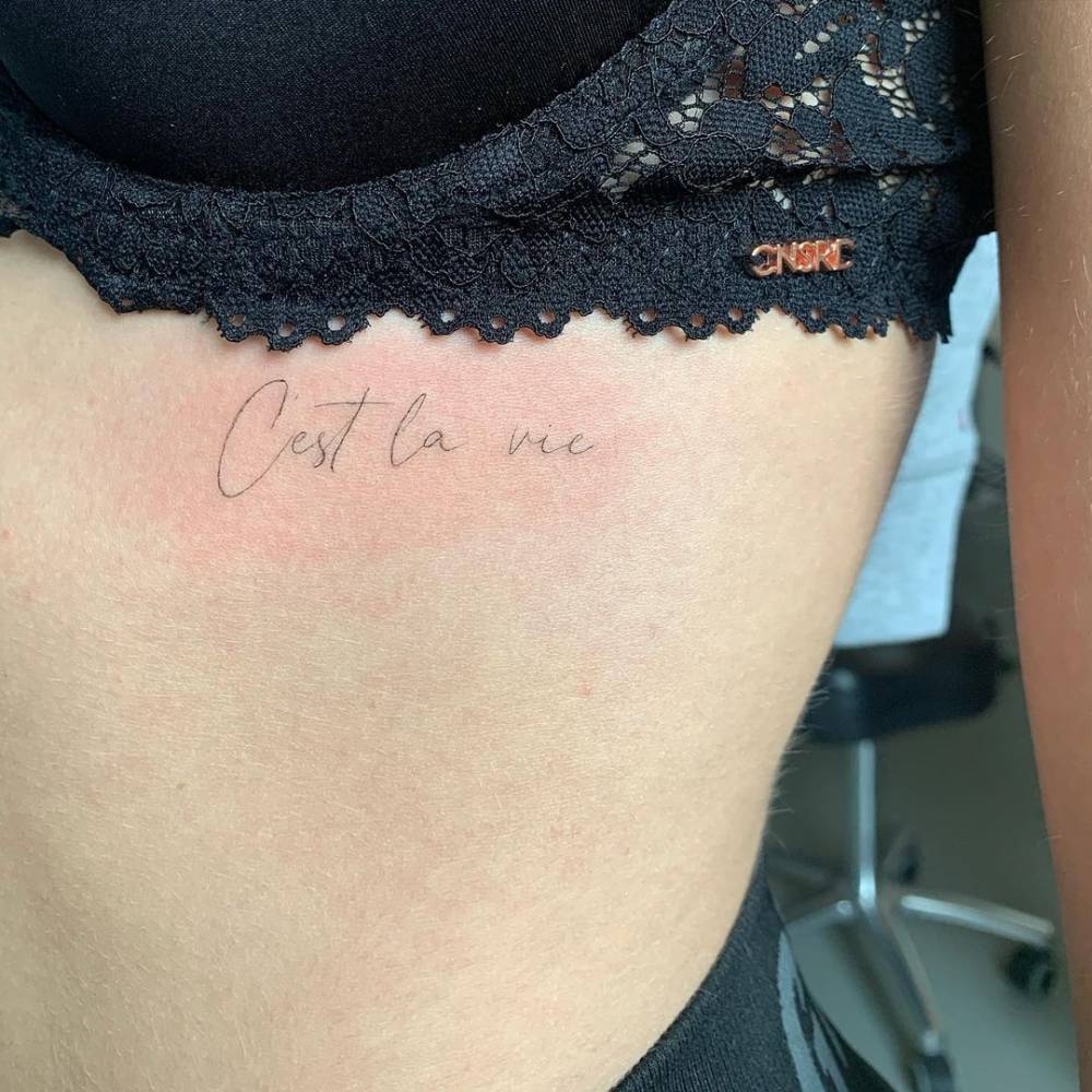 C'est La Vie" Lettering Tattoo On The Rib. 1000_x_1000_jpg