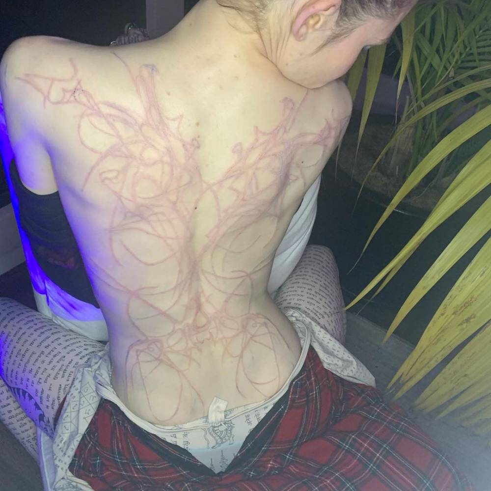White Ink "Alien Scars" Tattoo On Grimes' Back. 1000_x_1000_jpg