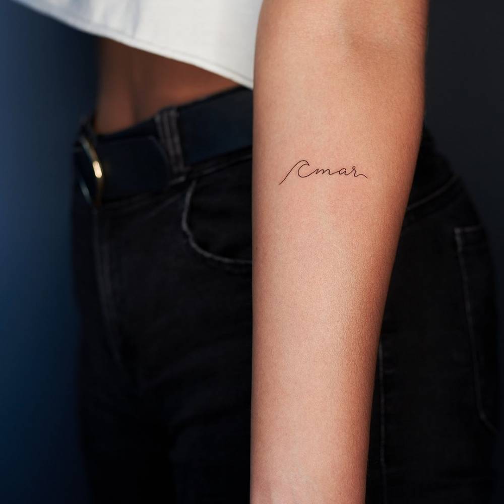 Wave Forming The Word "Amar" Tattooed On The Inner 1000_x_1000_jpg