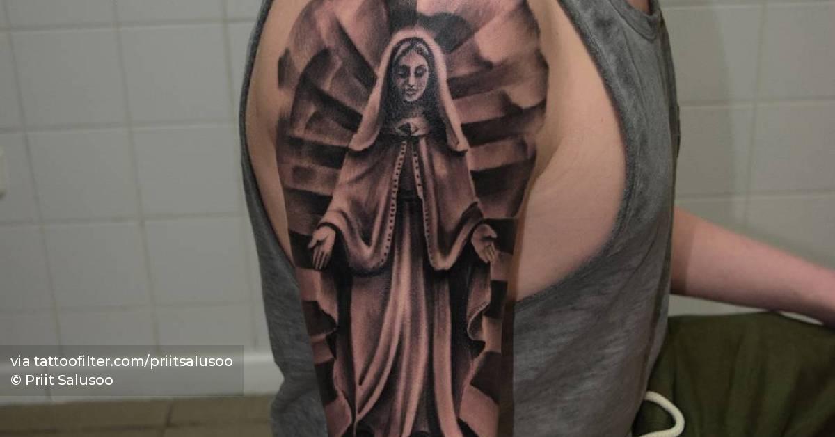 Black And Grey Virgin Mary Tattoo On The Upper Arm. 628_x_1200_jpg
