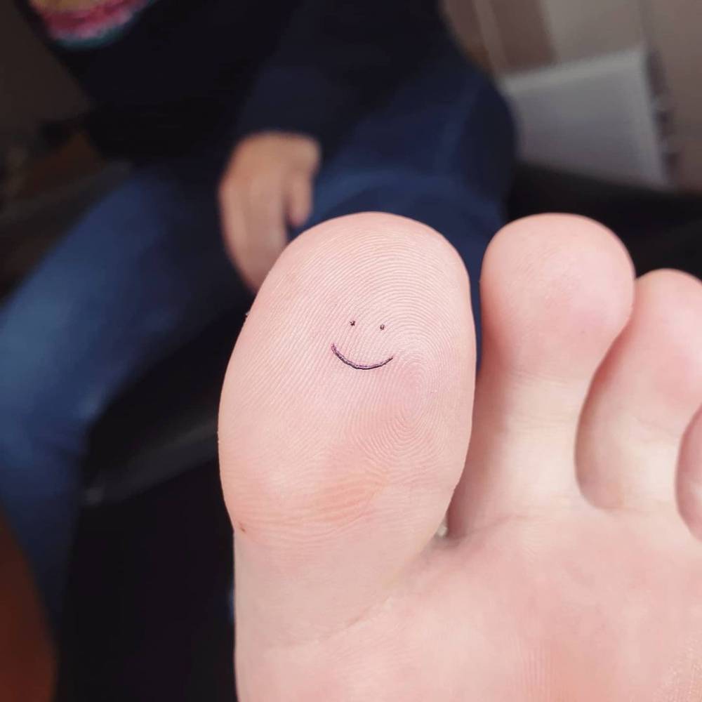 Minimalist Smile Tattoo On The Toe. 1000_x_1000_jpg