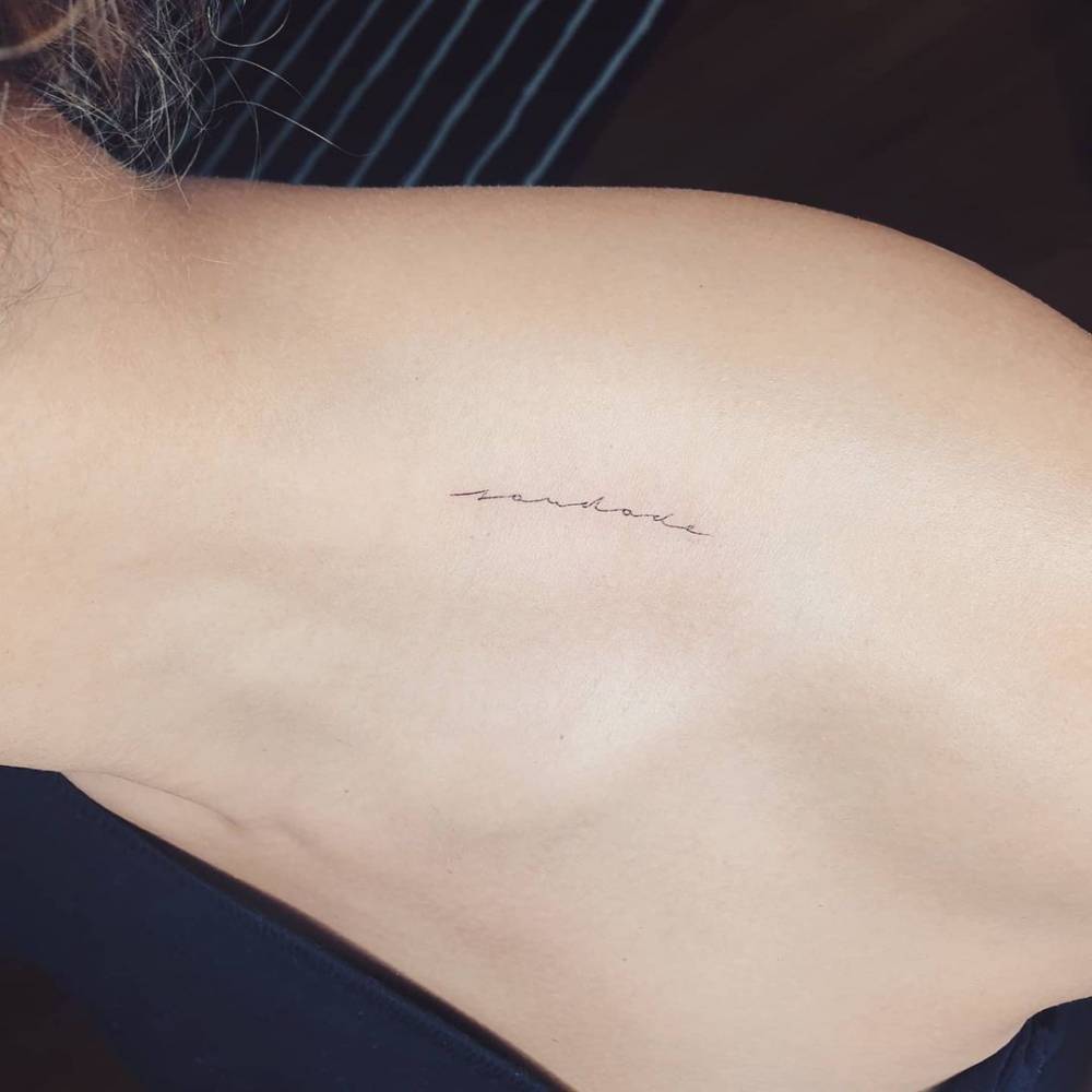 Saudade" Lettering Tattoo On The Top Of The Shoulder. 1000_x_1000_jpg