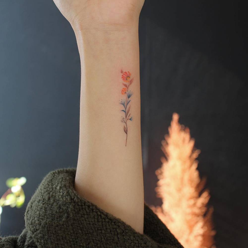 Watercolor Style Flower Tattoo On The Forearm. 1000_x_1000_jpg