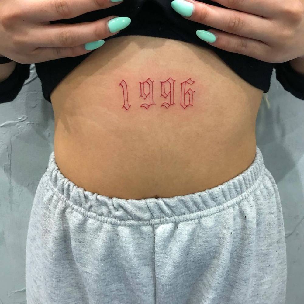 1996" Lettering Tattoo On The Stomach. 1000_x_1000_jpg