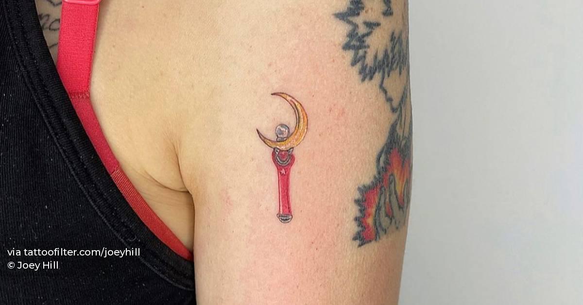 Moon Stick Tattoo On The Upper Arm. 628_x_1200_jpg