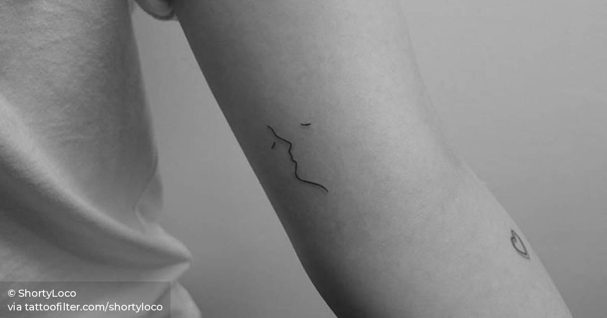 Minimalist Kiss Tattoo On The Left Inner Arm. 628_x_1200_jpg
