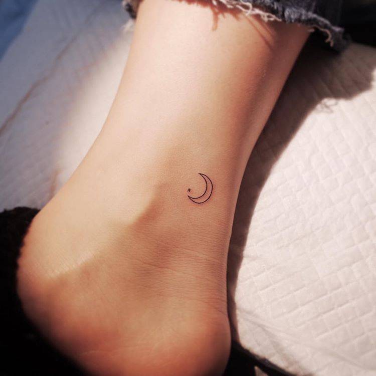 Minimalist Crescent Moon Outline Tattoo On The Ankle. 750_x_750_jpg