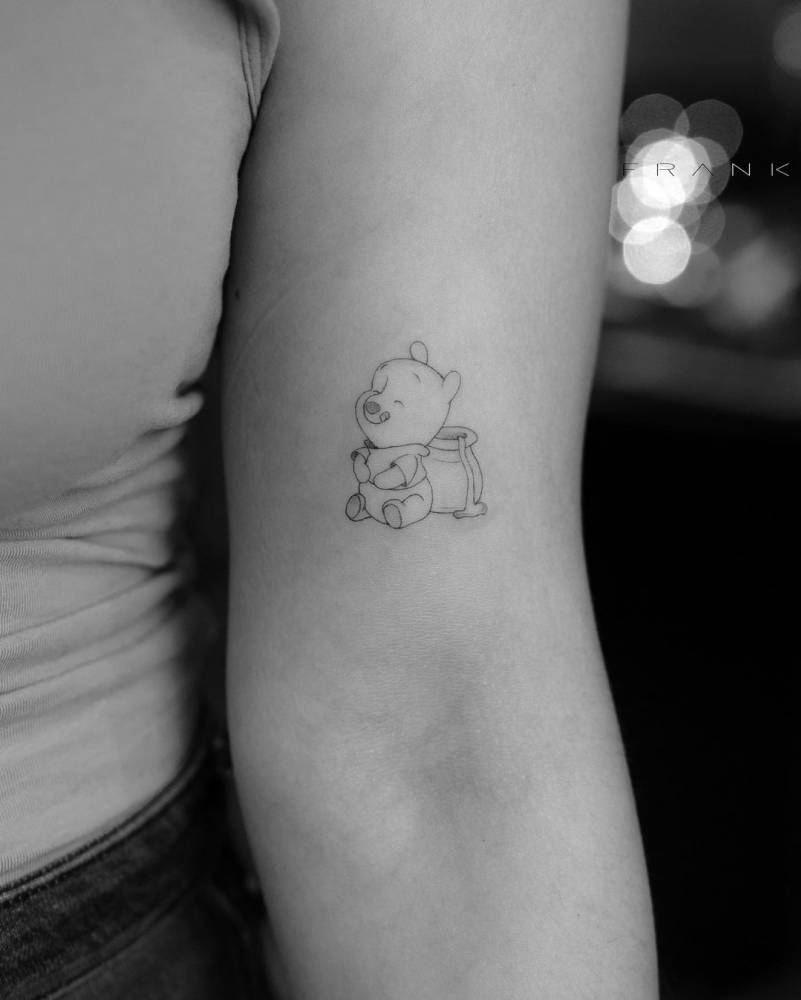 Pooh Bear Tattooed On The Bicep. 1000_x_801_jpg