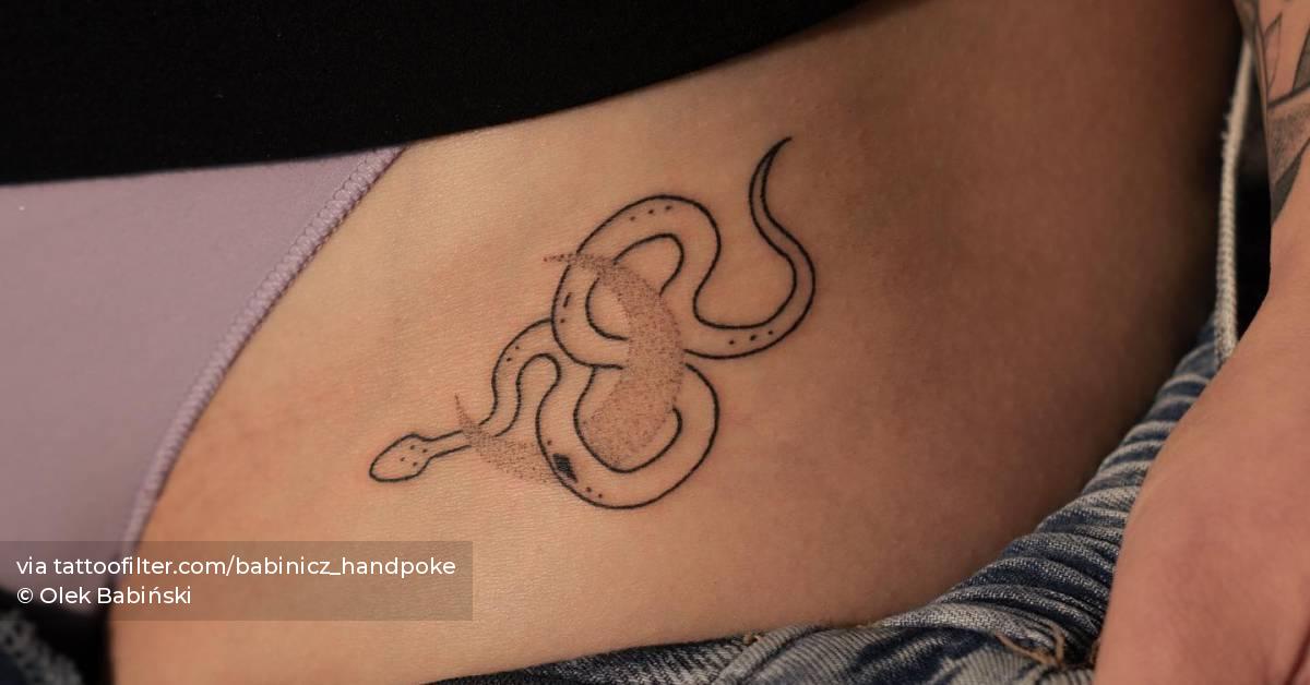 Tattoo Of A Snake And Moon Hand Poked On The Pelvis. 628_x_1200_jpg