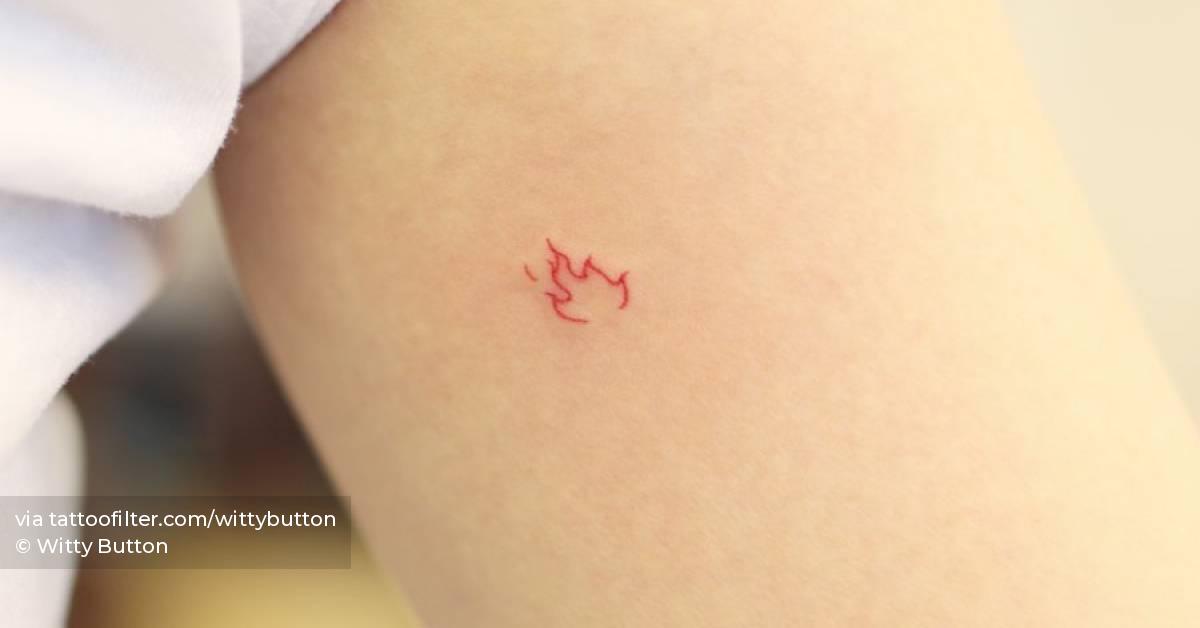 Tiny Flame Tattoo Done On The Inner Arm Using Red Ink. 628_x_1200_jpg