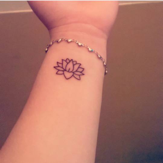 Lotus Flower Tattoo On Melina's Left Wrist. 540_x_540_jpg