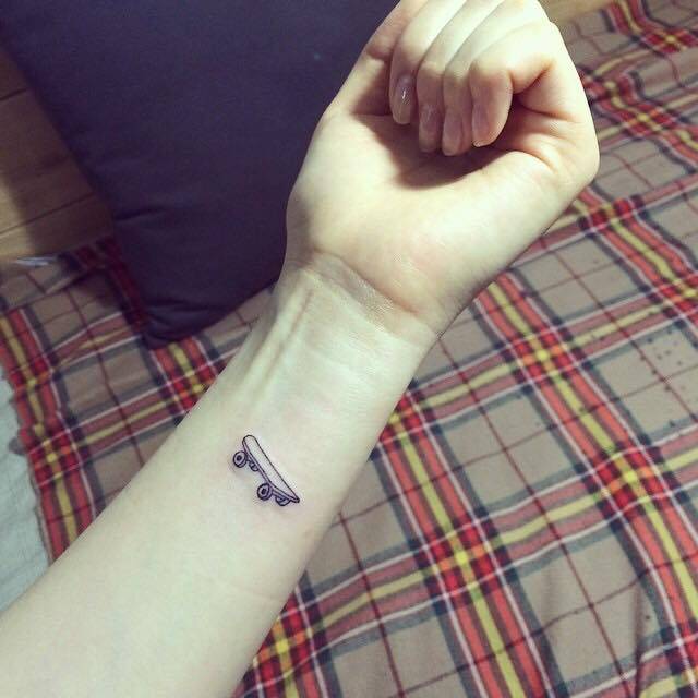Small Skateboard Tattoo On The Left Forearm. 640_x_640_jpg