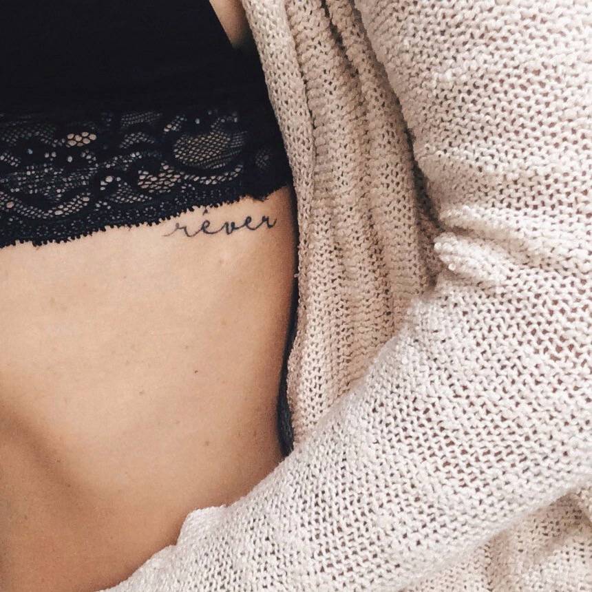 Rib Tattoo Saying "Rêver", French For "To Dream." 860_x_860_jpg