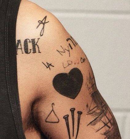 Coat Hanger Tattoo On Harry Styles' Left Arm, By His 454_x_423_jpg