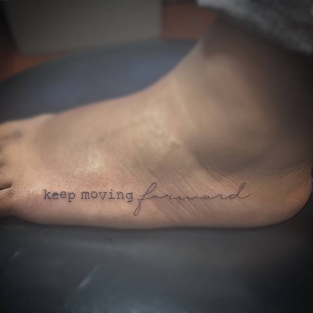 Keep Moving Forward" Tattoo On The Left Foot. 640_x_640_jpg