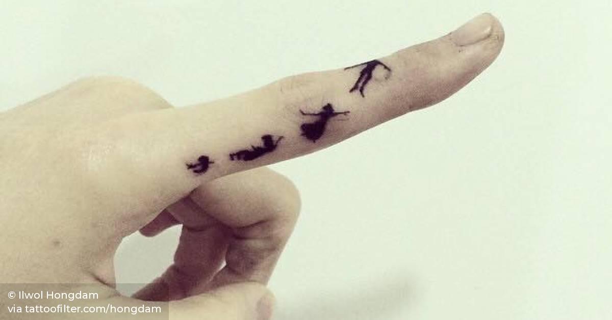 Peter Pan Inspired Tattoo On The Left Index Finger. 628_x_1200_jpg