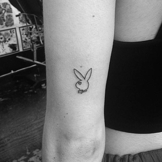 Small Playboy Logo Tattoo On The Back Of The Left Arm. 640_x_640_jpg