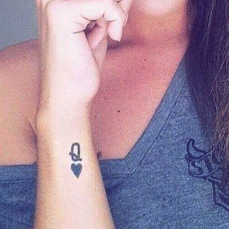 Wrist Tattoo Of The Mark Of The Queen Of Hearts On 754_x_754_jpg