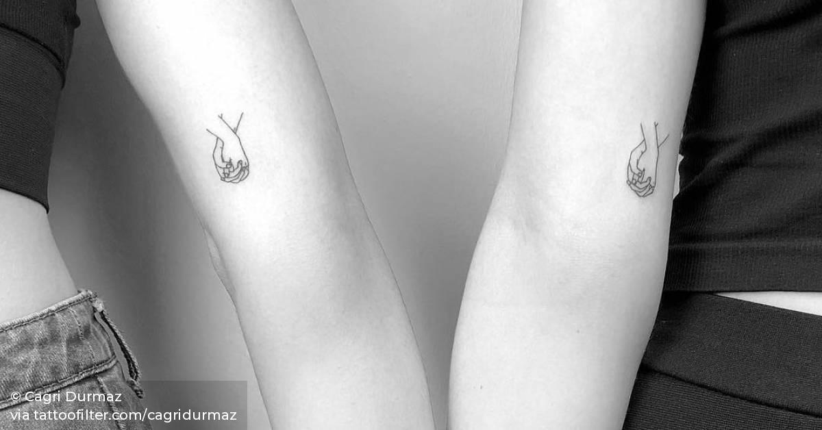 Best Friend Matching Holding Hands Tattoo. 628_x_1200_jpg