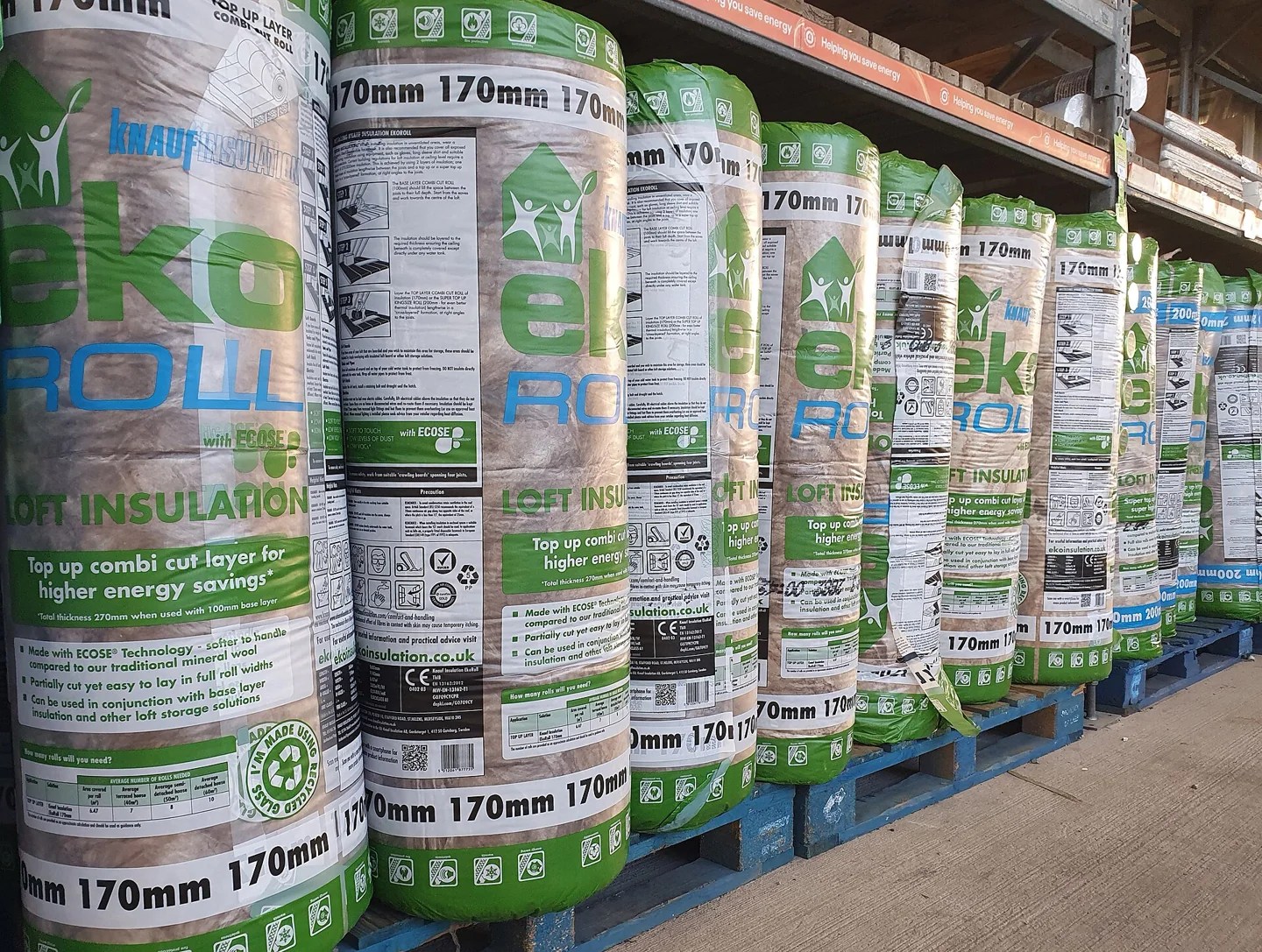 Rolls of loft insulation displayed in a store