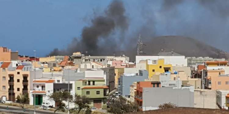 a workshop burns in flames