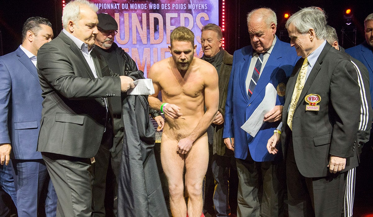 Wrestlers weigh in naked