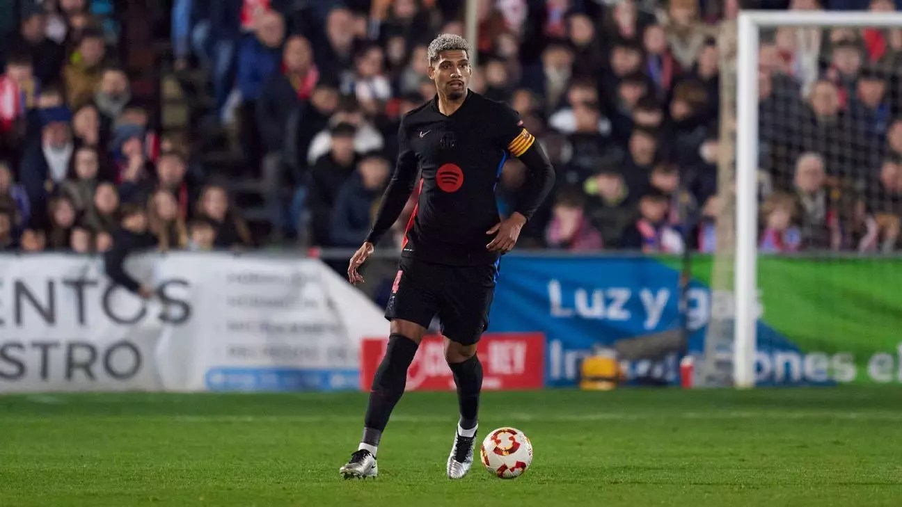 Barcelona’s Pursuit to Retain Ronald Araújo Amidst Defensive Challenges