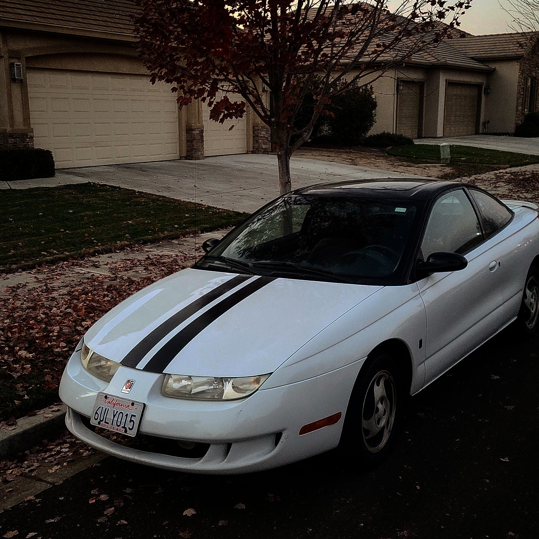 1999 saturn sc2 white hot