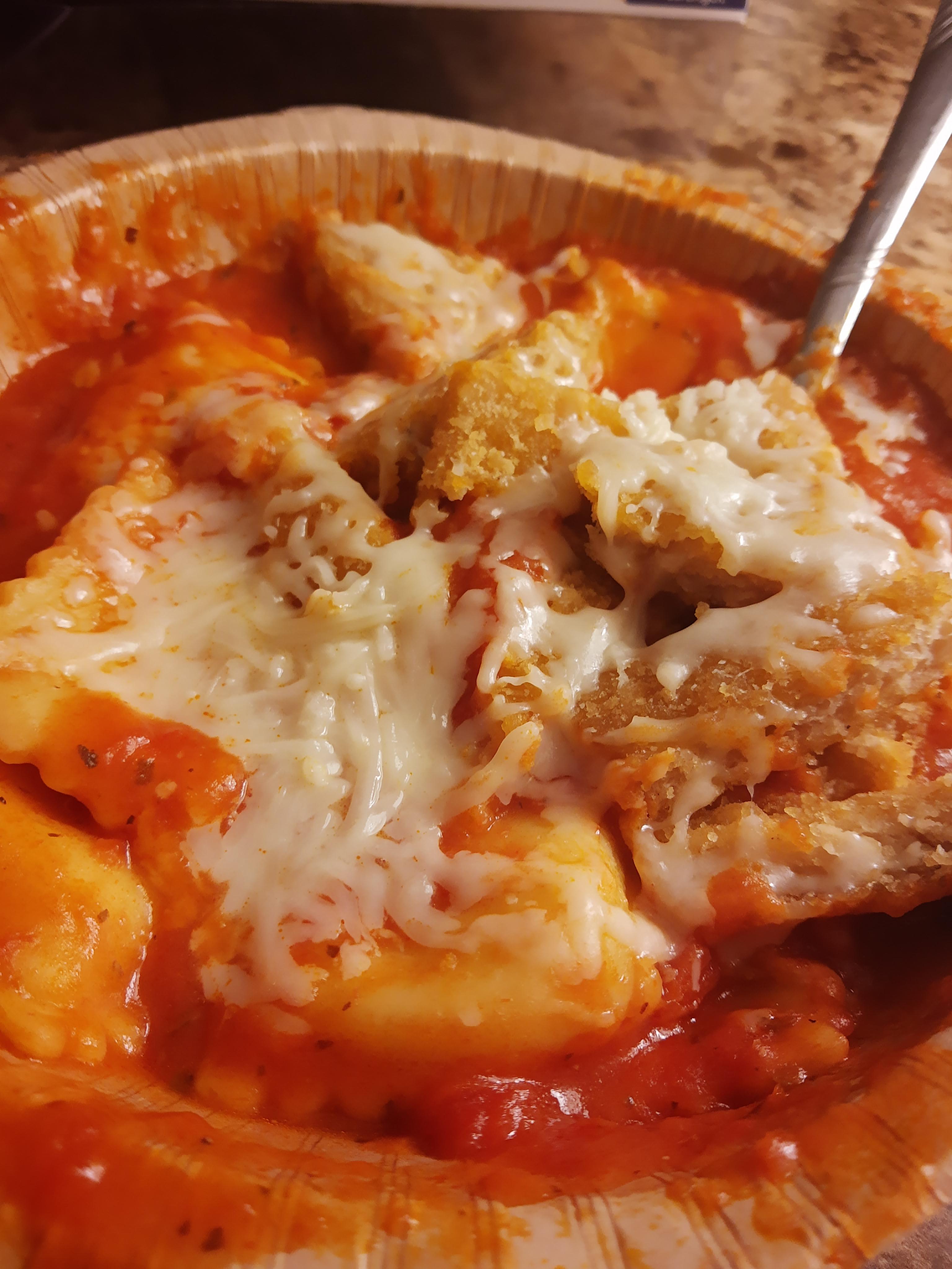 In some universe, this is chicken Parm. (Frozen ravioli and meatless chicken patty with Kraft shredded cheese) : rshittyfoodporn Chicken parm ravioli