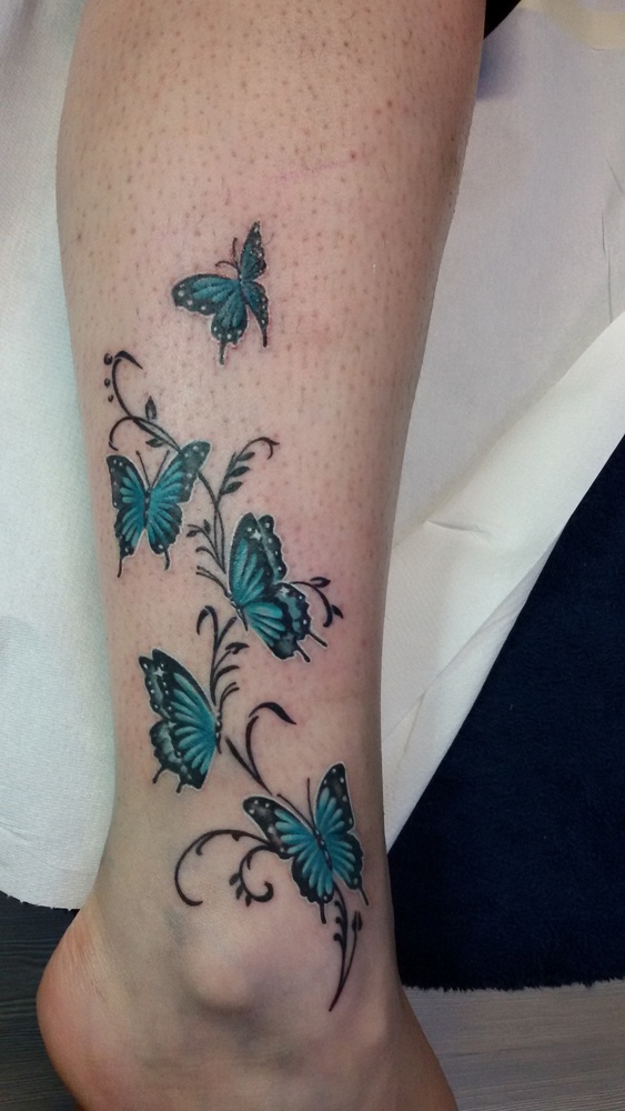 Tatuaggio Farfalle E Stelle - Denis Trevisani Tattoo Studio 1000_x_563_jpg