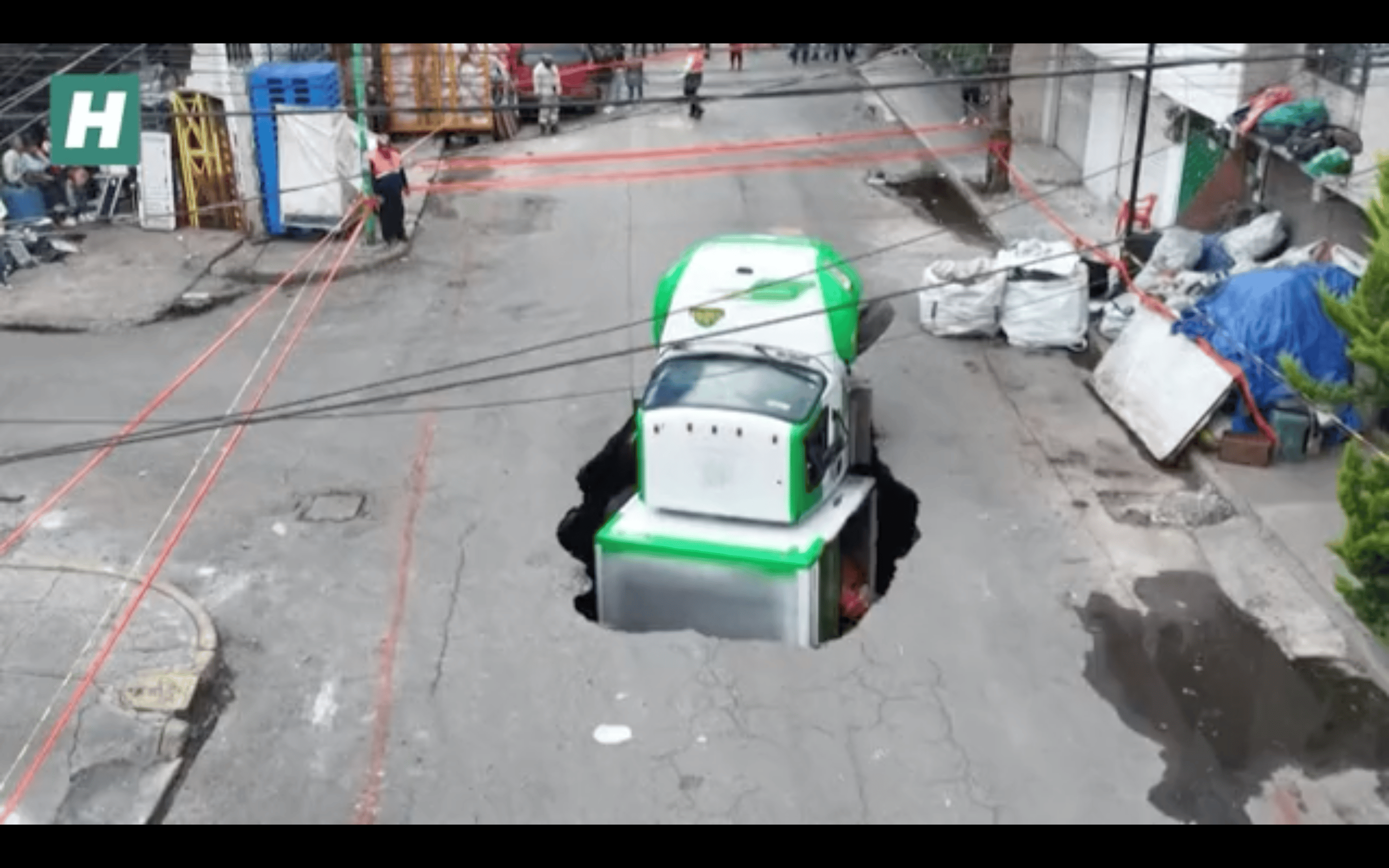 WATCH: Sinkhole Swallows Soda Delivery Truck In Mexico City